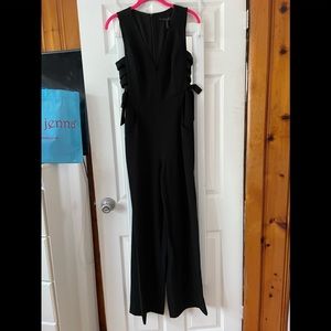 Black jumpsuit with sides that lace up